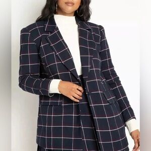 Womens navy plaid long strong shoulder blazer w/matching pleated skirt.